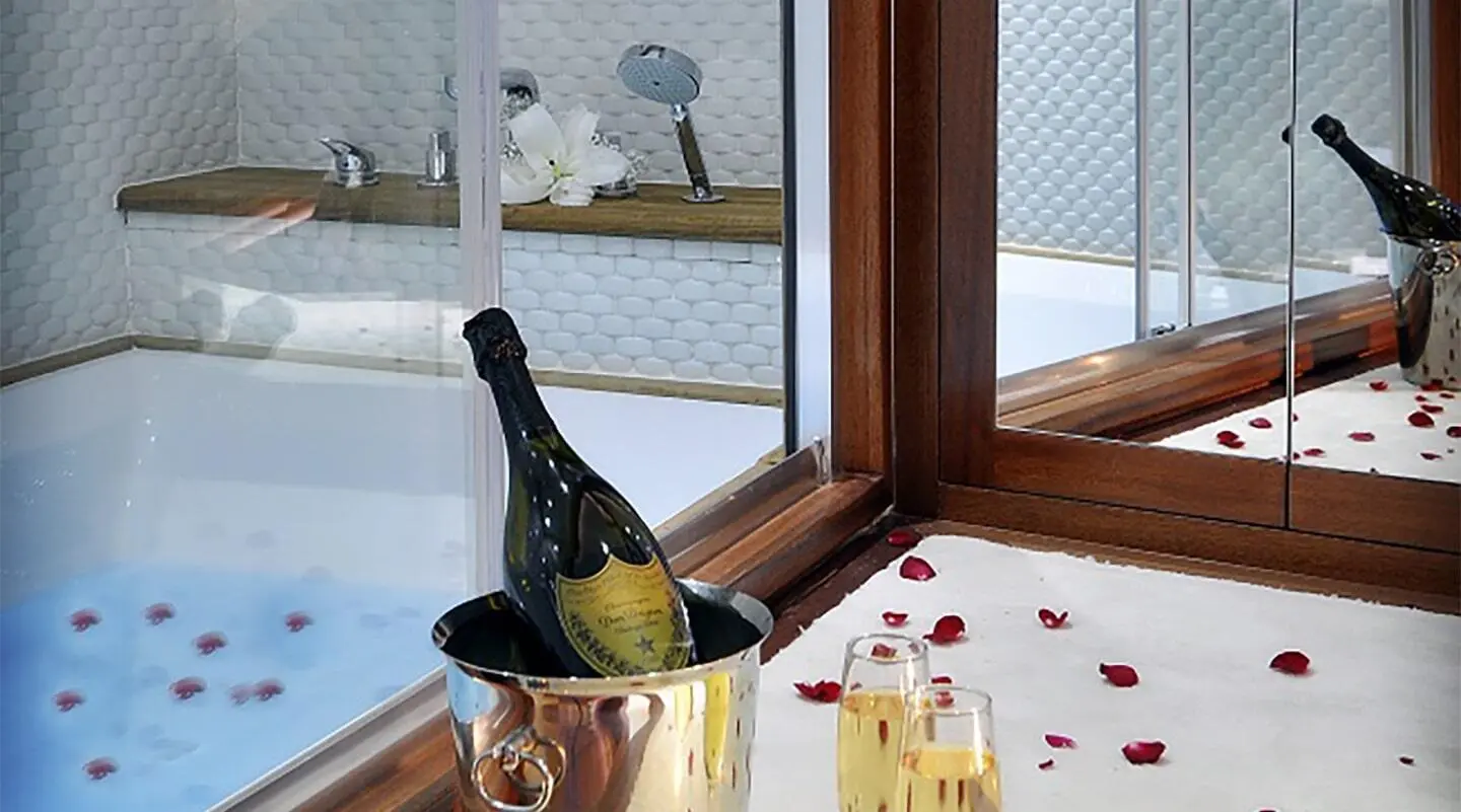 Dolce Mare gulet bathroom scene with window and bottles