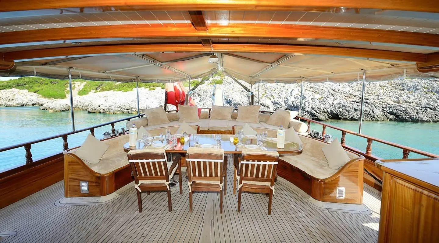 Zephyria II gulet aft deck with wooden table and chairs