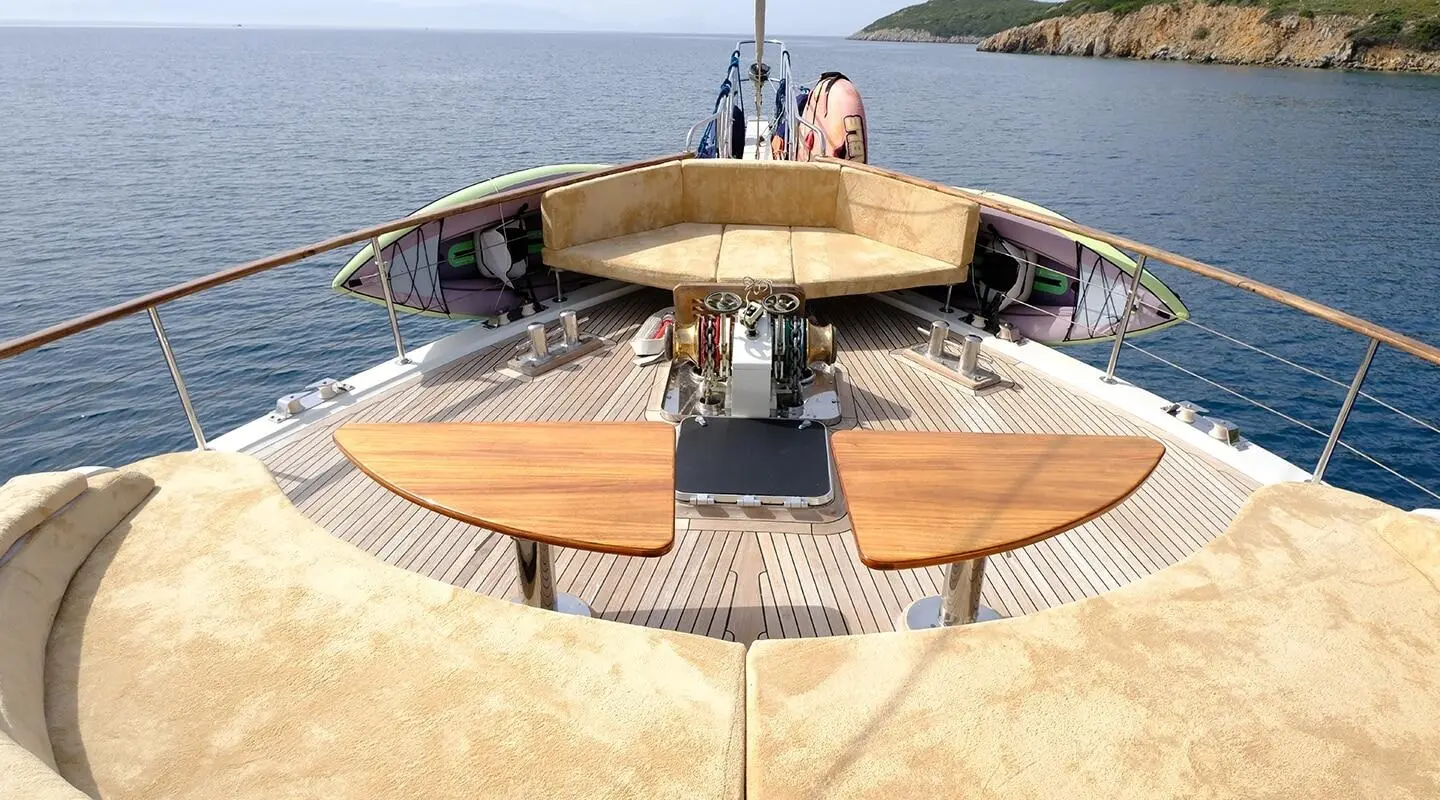 Queen Of Sea yacht on sandy beach with open aft deck and seating