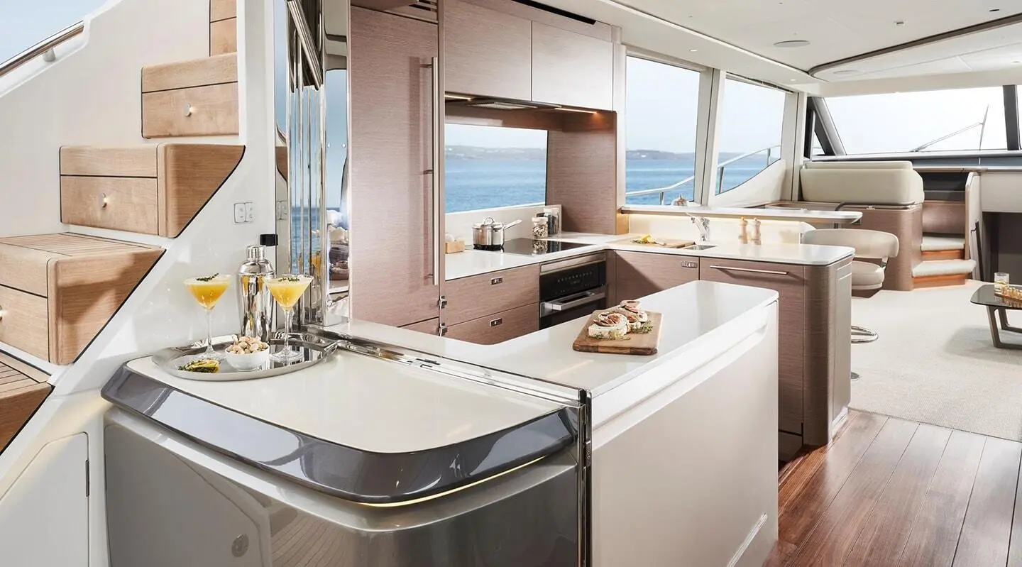 Interior view of Elizabeth yacht: sleek galley with countertops and seating