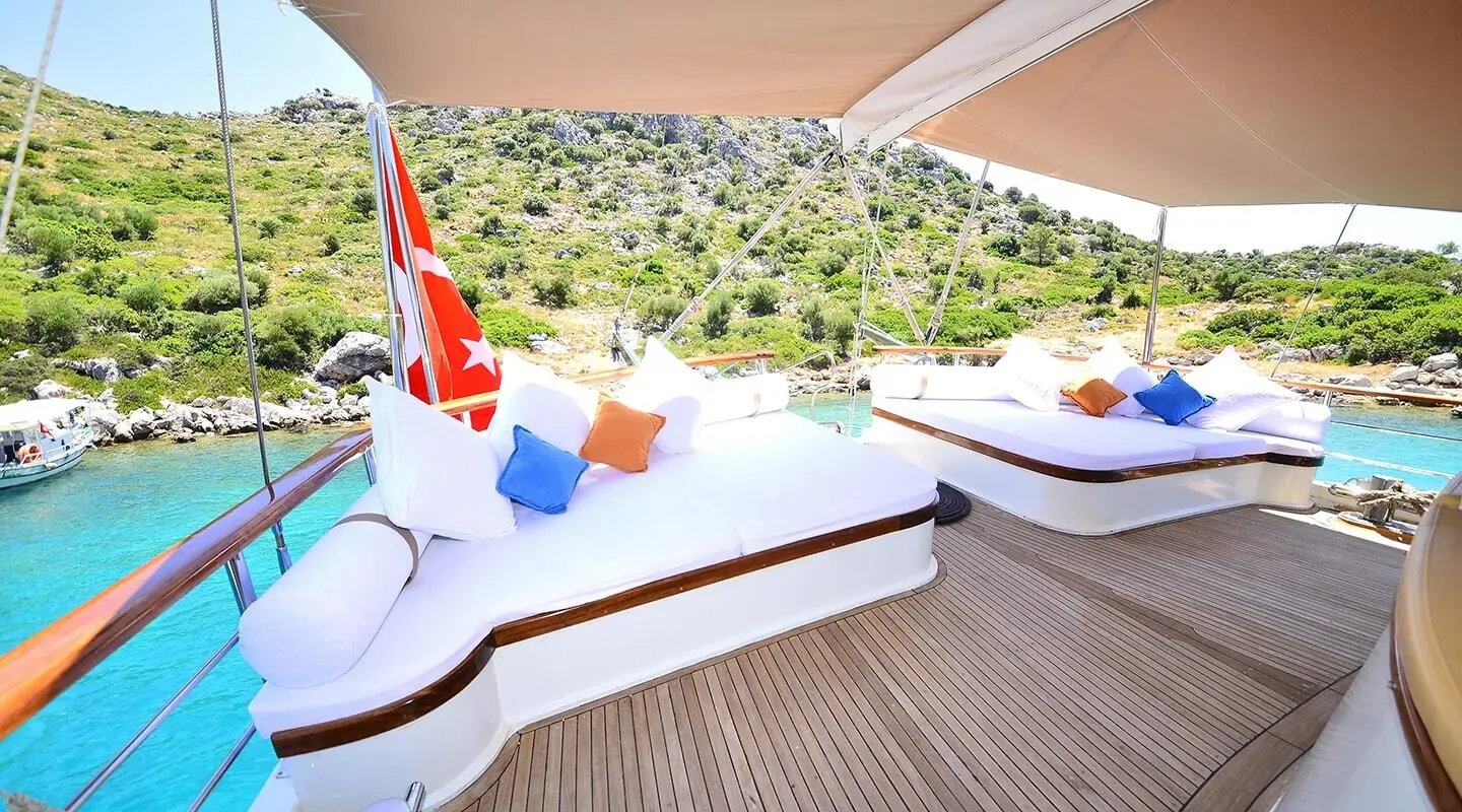 Gulet Prenses Bugce aft deck with large cushioned seating area