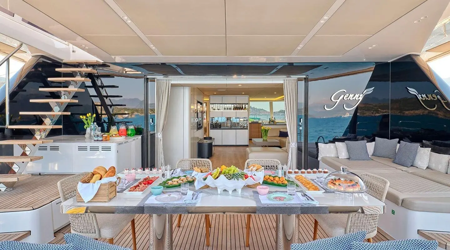 Genny yacht dining area with table set and seating visible