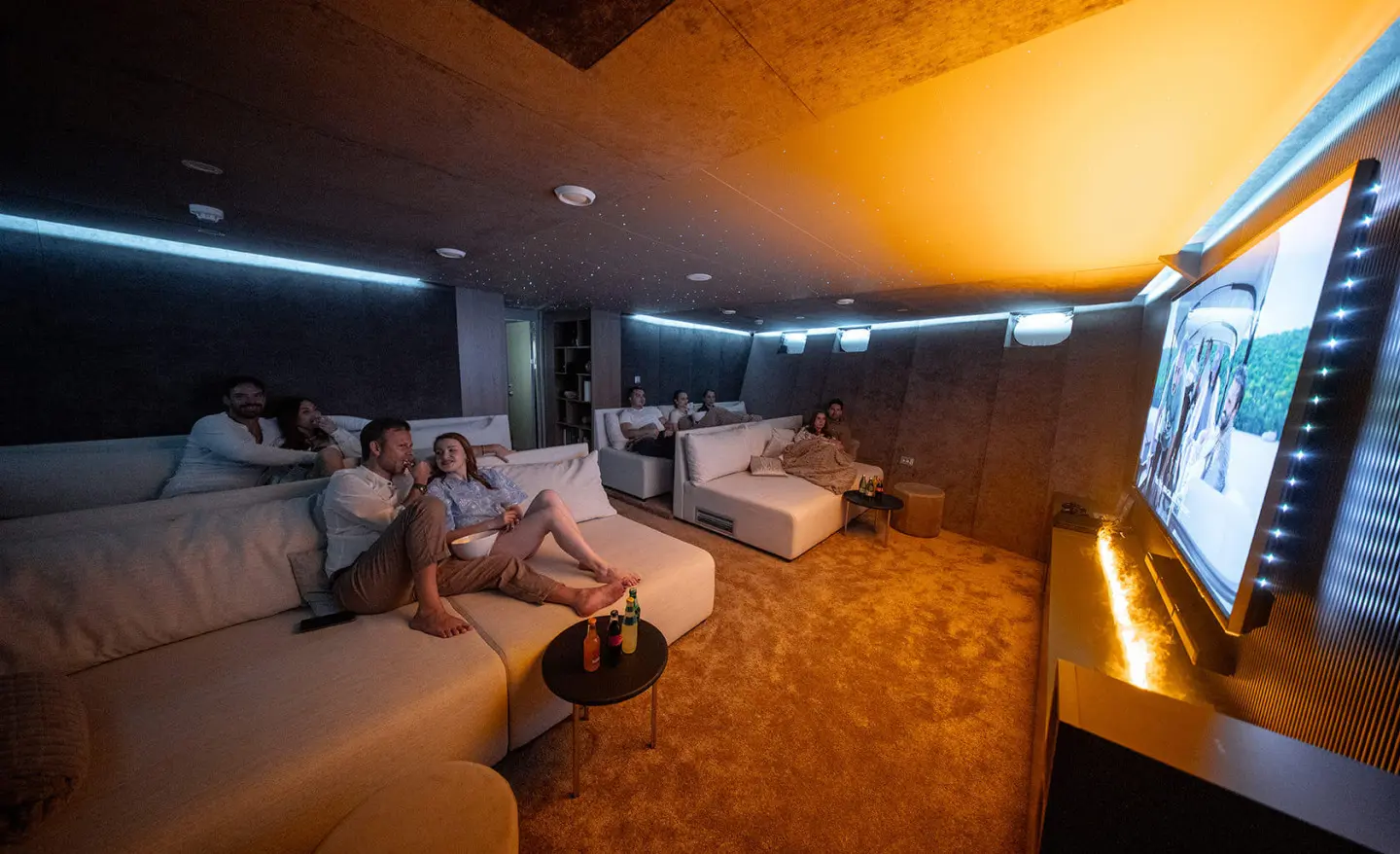 Interior of Cristal luxury yacht saloon with seating and warm ambient lighting