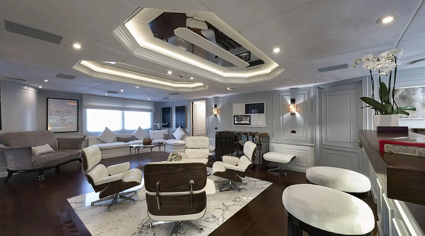Chakra yacht lounge area with soft seating and curved ceiling opening