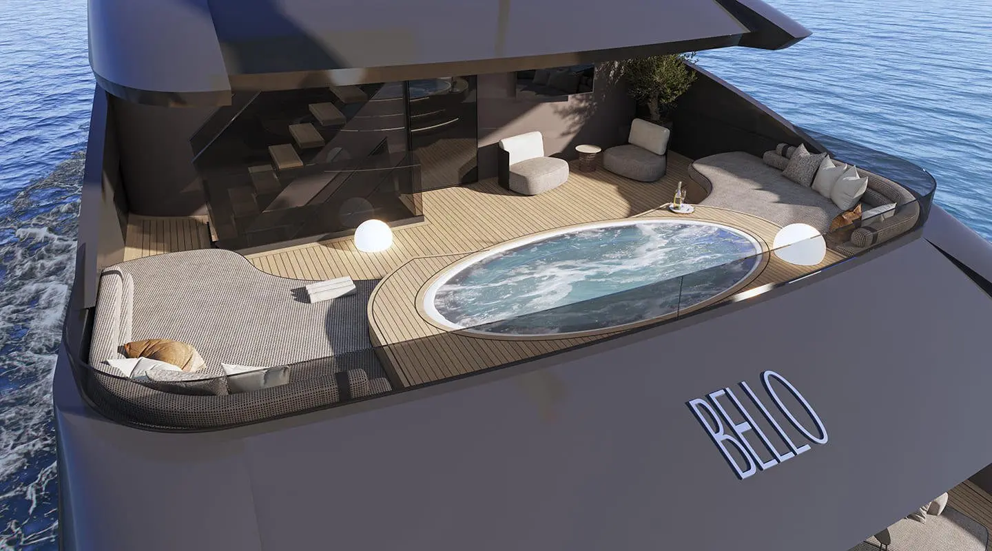 Yacht Bello upper deck with jacuzzi, seating, and sun loungers aboard