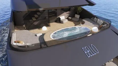 Yacht Bello upper deck with jacuzzi, seating, and sun loungers aboard