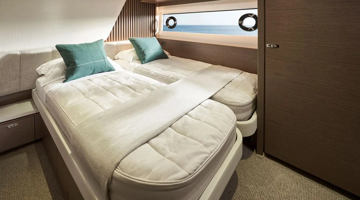 Elizabeth yacht interior with a double cabin and neatly made beds