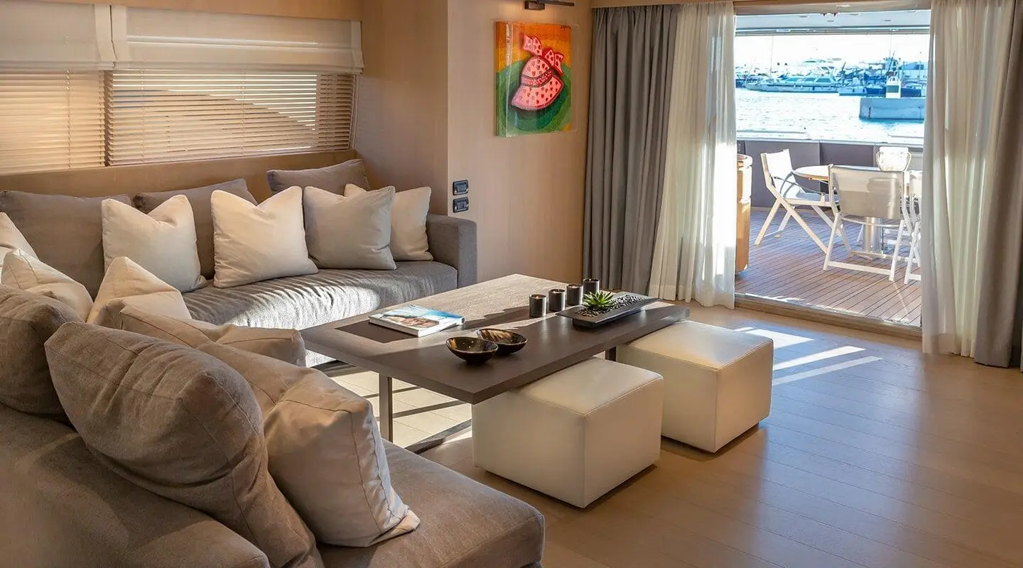Interior view of Summer Fun motor yacht salon with seating area and table