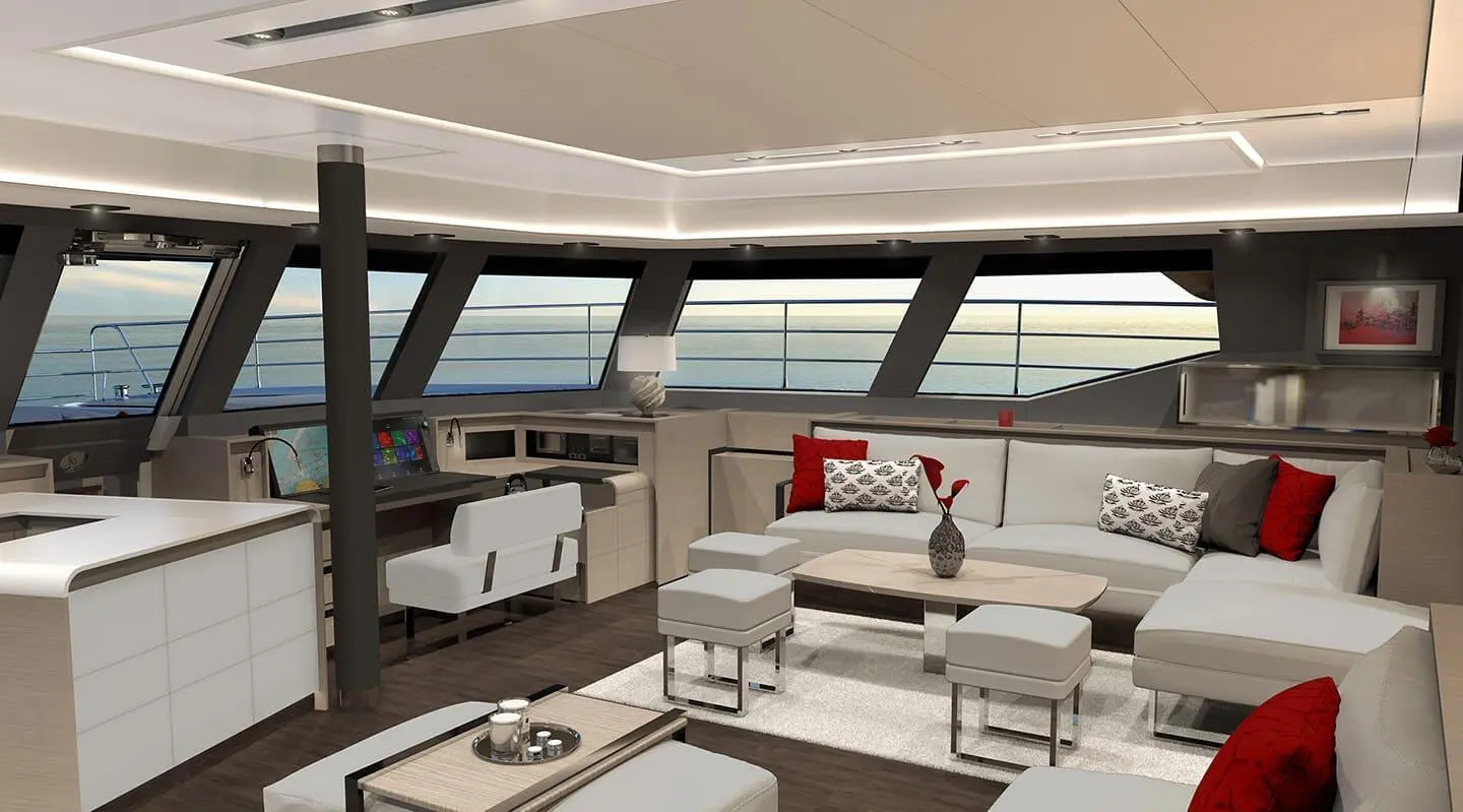 D2 yacht saloon interior with white seating, cushions, and a coffee table at sunset light