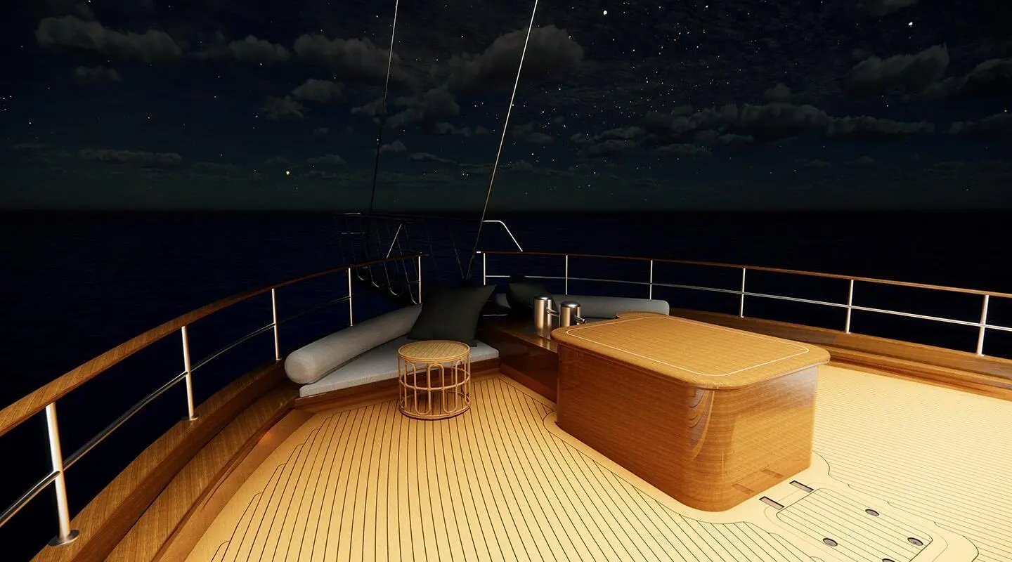 Bow deck of Tosca gulet at night, wooden deck, ropes, and railings visible