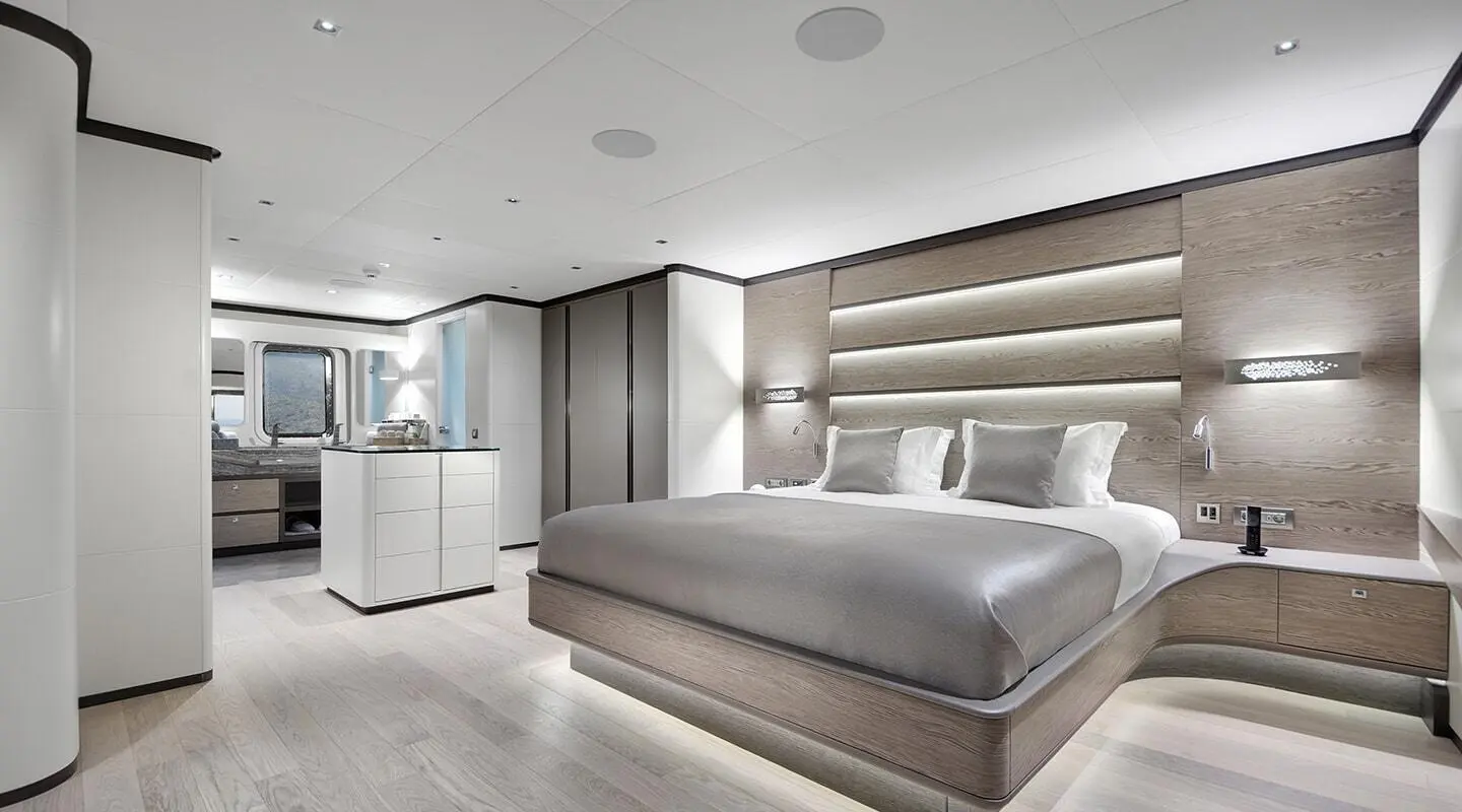 Yacht master suite aboard All About U 2 with king bed and modern decor