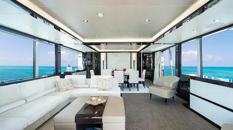 Luxurious yacht Quantum saloon with large seating and glass doors