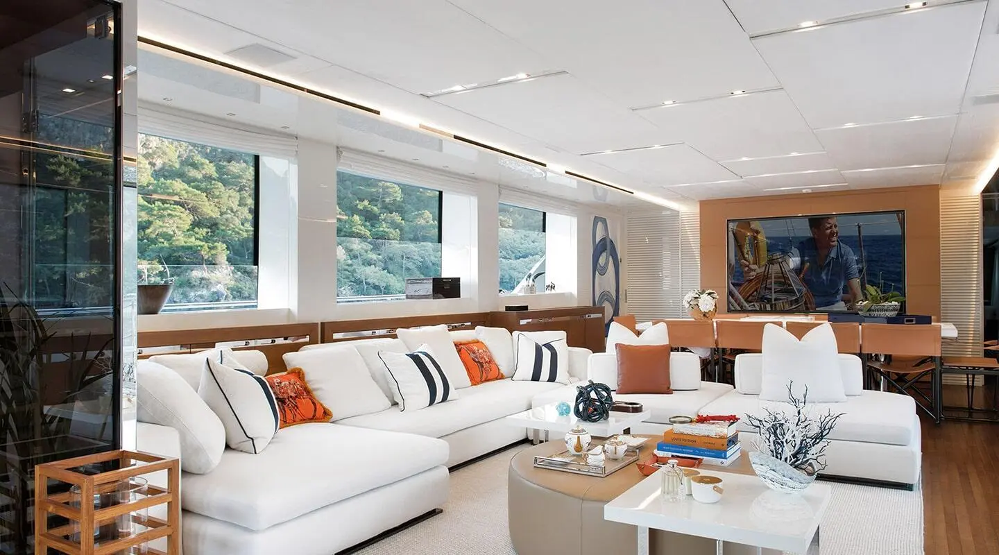 Morning Star motor yacht saloon with white seating and decorative items