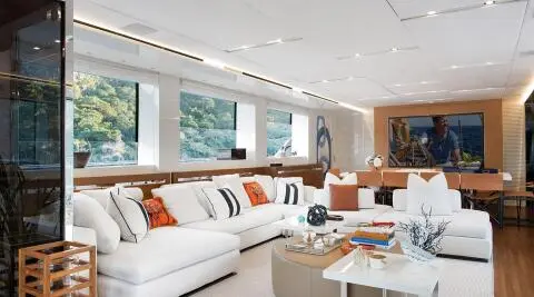 Morning Star motor yacht saloon with white seating and decorative items
