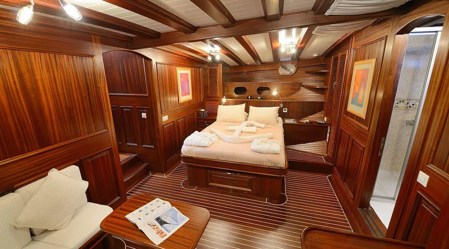 Zephyria II luxurious mahogany-clad cabin with king-size bed and polished wood interiors