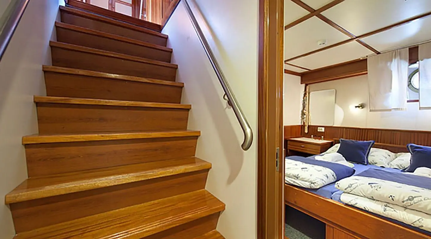 Wooden stairs and corridor aboard Tajna Mora gulet