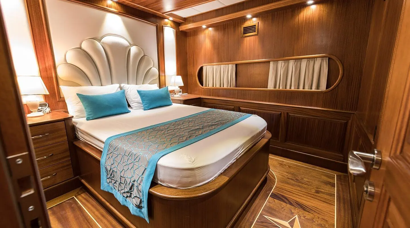 Vista Mare luxury gulet at sunset with deck seating and calm water