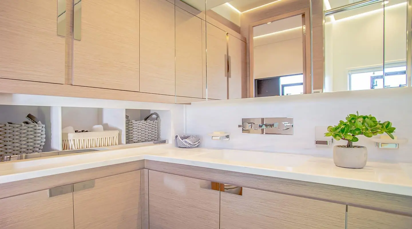 D2 motor yacht galley with countertop, cabinets and clean lighting