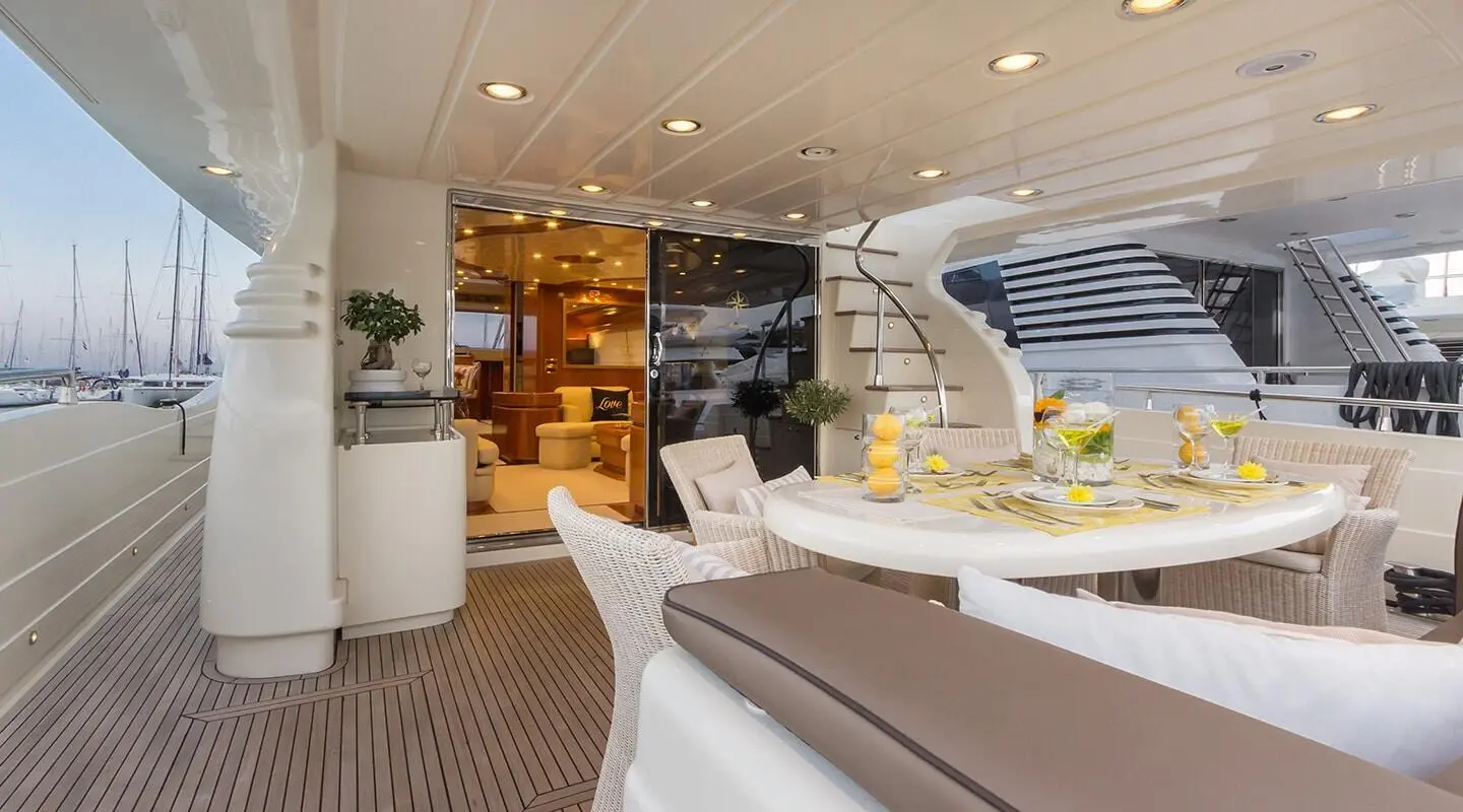 Amoraki yacht deck scene with seating, helm area, and modern fixtures onboard