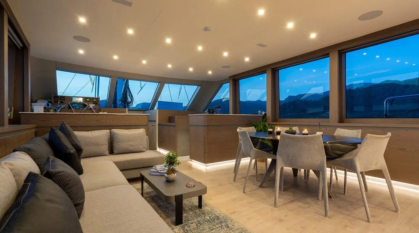 Gulet Good Life saloon interior with large seating area and wide windows