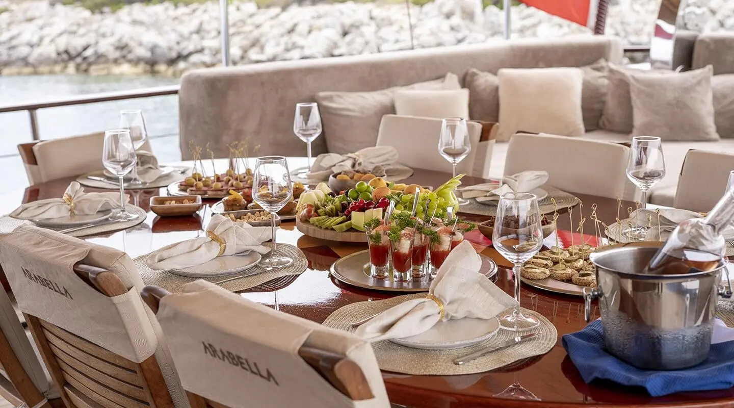 Arabella yacht gulet with table setting and dishes