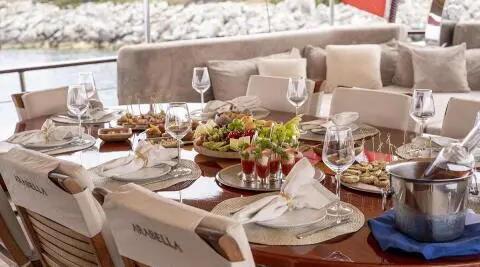 Arabella yacht gulet with table setting and dishes
