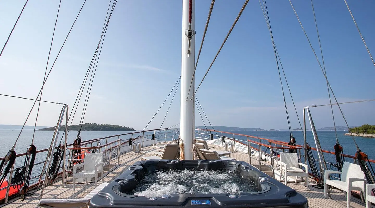 View of Amorena motor yacht with a Jacuzzi on the deck and seating area