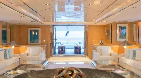 O'Natalina yacht interior salon with sea-view doorway and seating