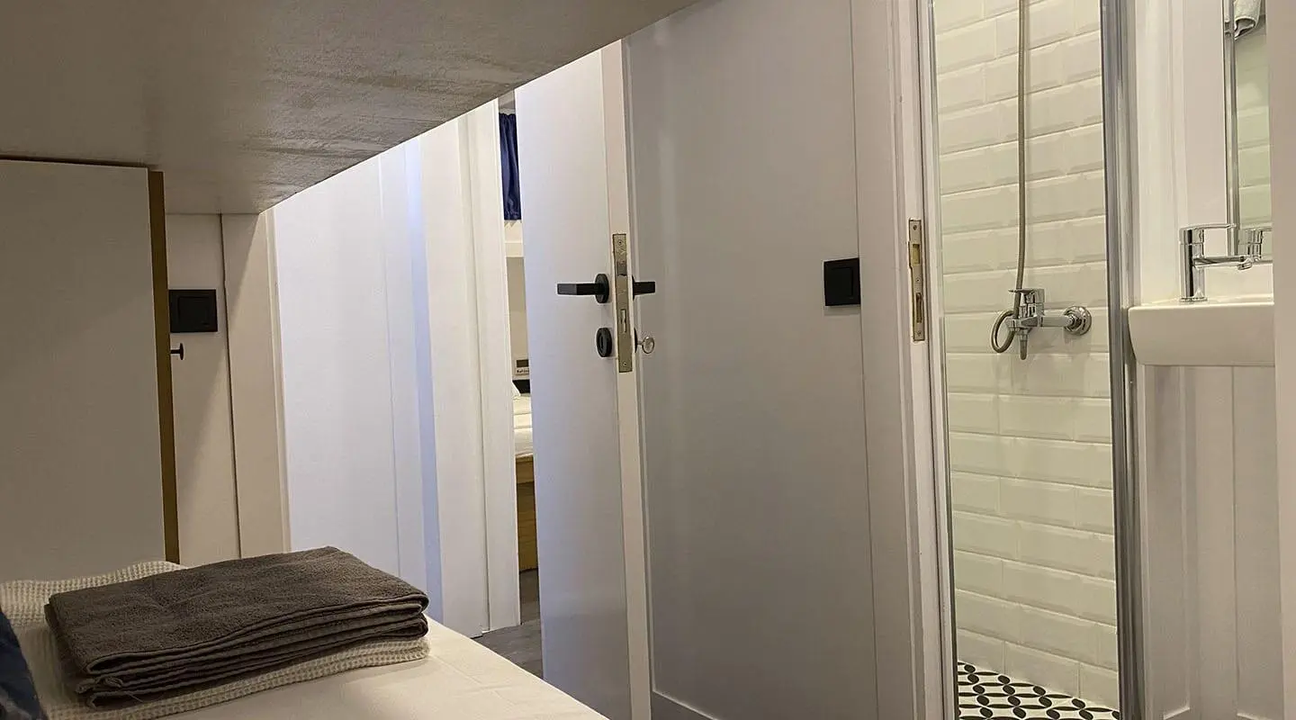 Maske 5 yacht interior corridor with doorway and bright light