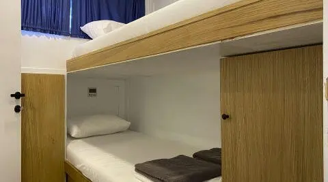 Interior cabin with bunk beds on Maske 5 yacht