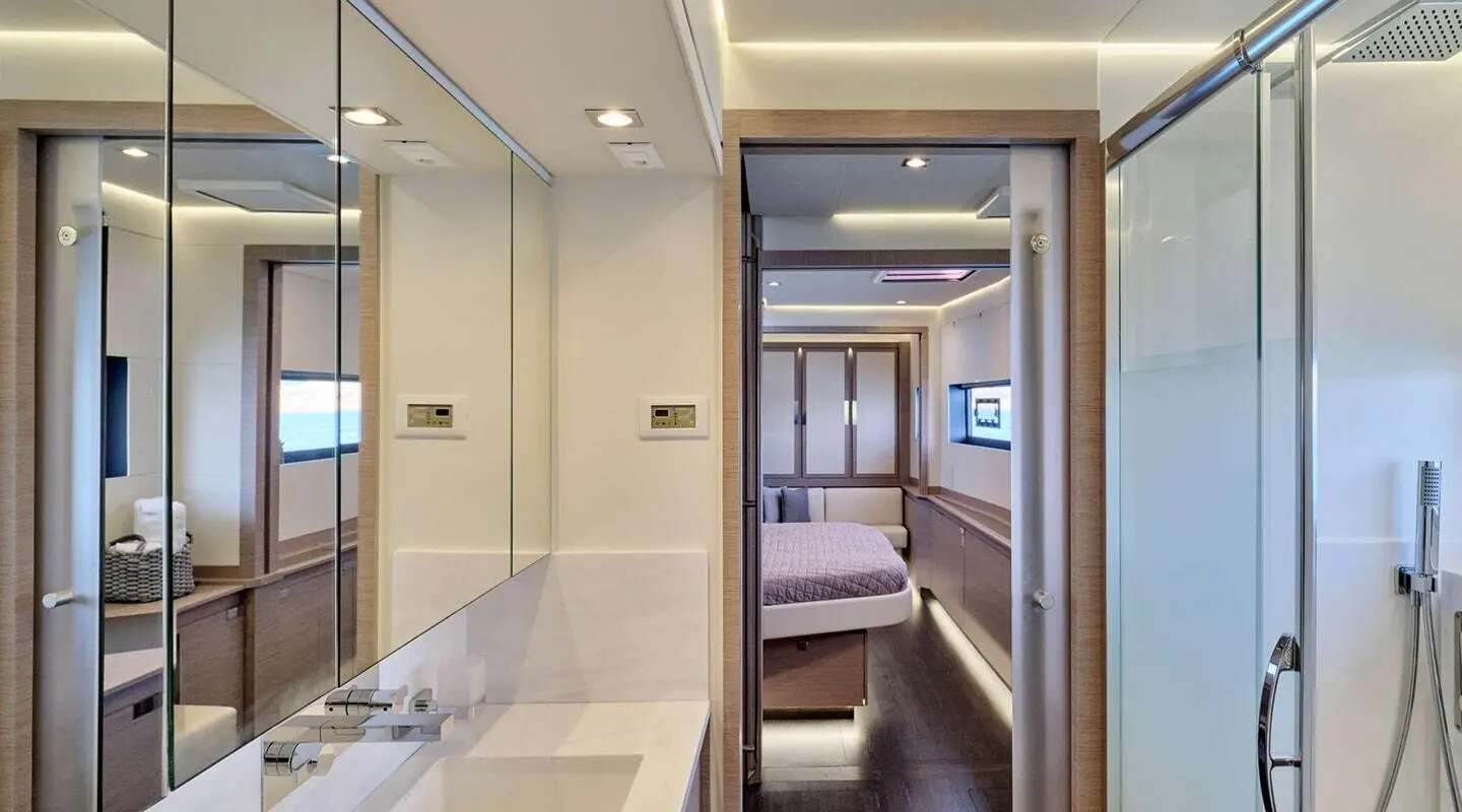 Luxurious yacht Christal Mio interior scene with hallway leading to cabin and bed