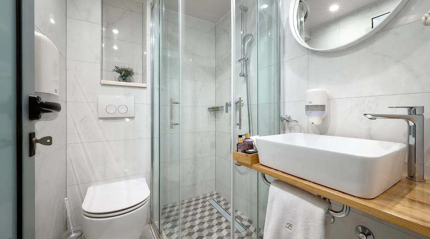 Bellezza luxury 52m yacht, modern marble bathroom with glass shower and vessel sink