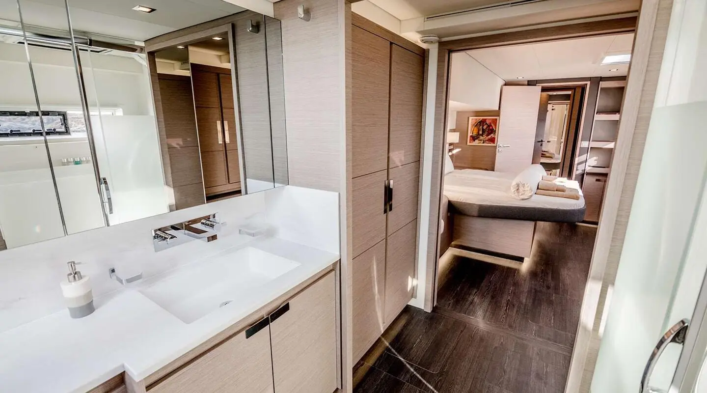 Astoria yacht deck interiors with a hallway, cabin door, and seating area