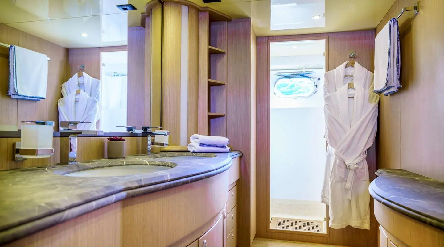 Phantom luxury yacht at sunset seen from interior bar area with deck windows