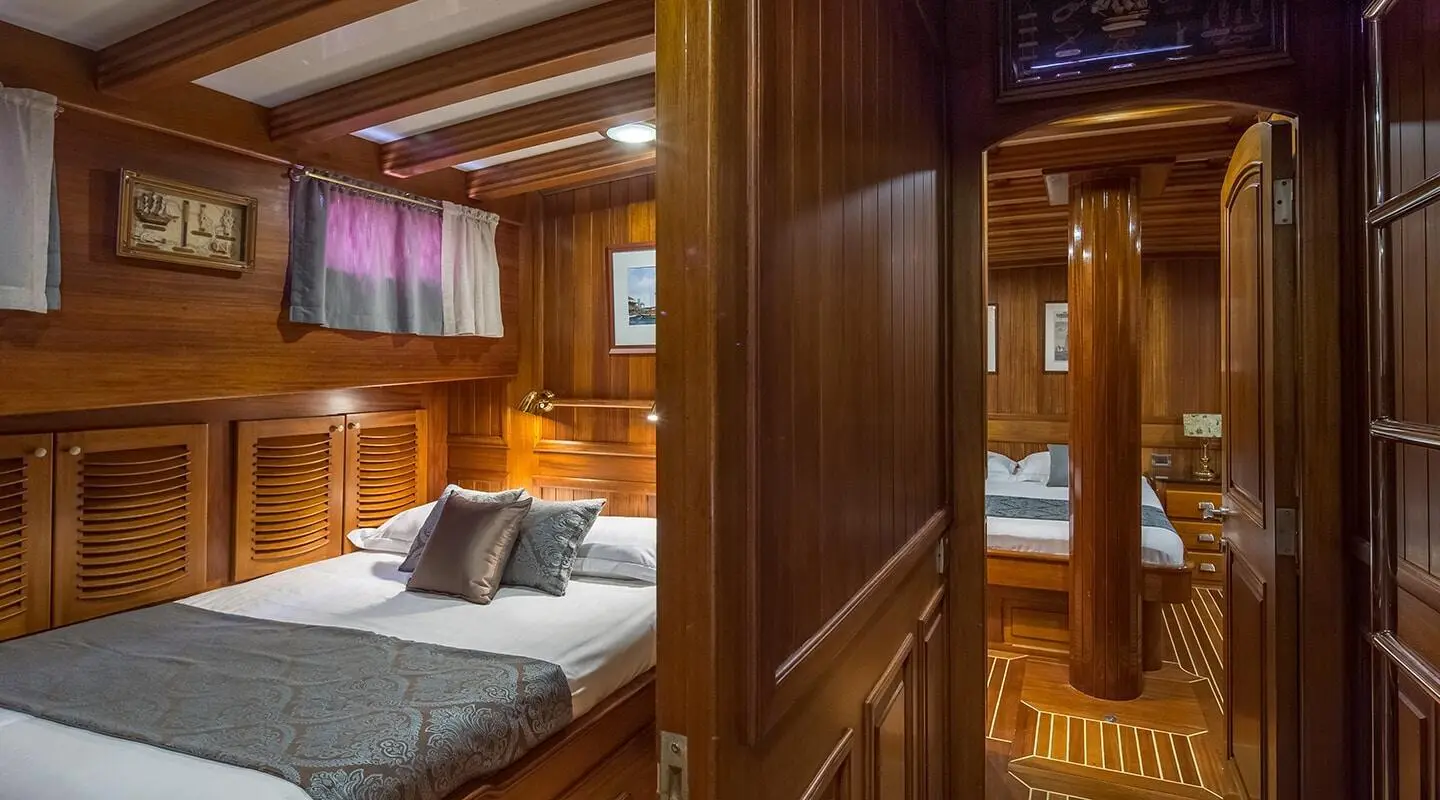 Sunset view of Carpe Diem 7 luxury yacht with calm sea and deck seating