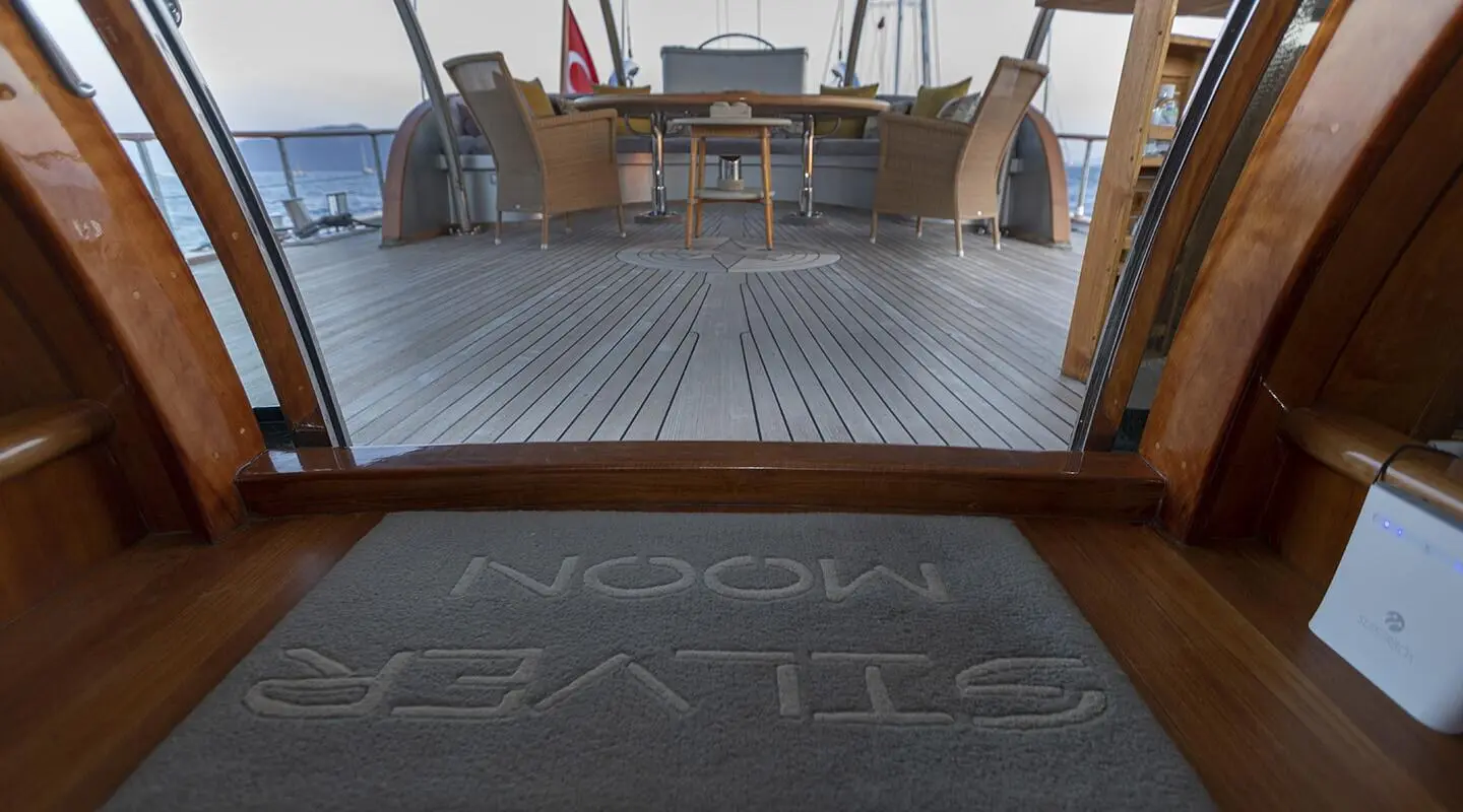 Aft deck of Gulet Silver Moon showing wooden decking and seating area on deck