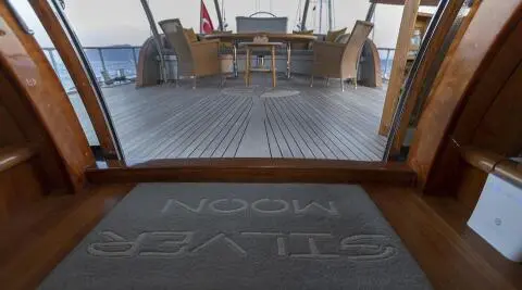 Aft deck of Gulet Silver Moon showing wooden decking and seating area on deck