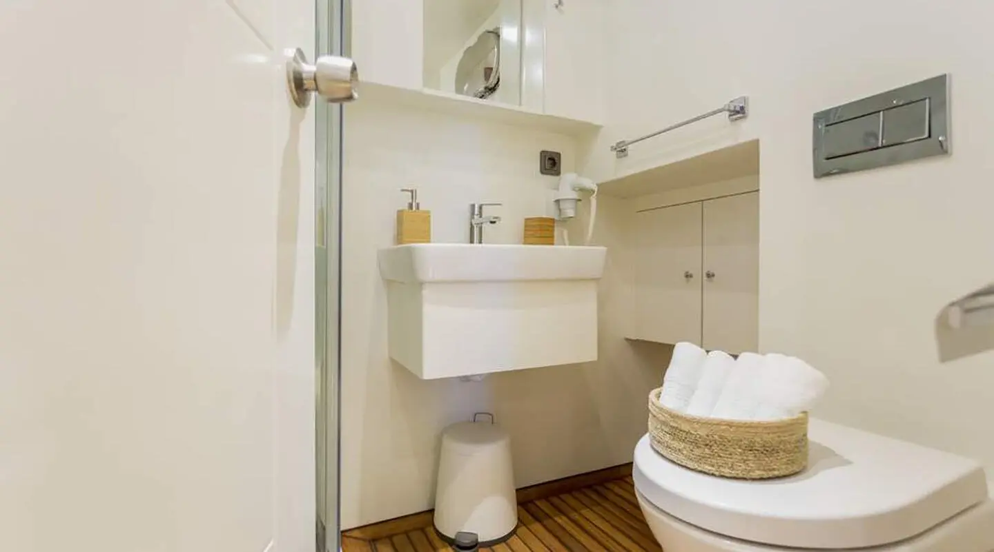 Grand Sailor luxury gulet yacht interior with white walls and wooden floor