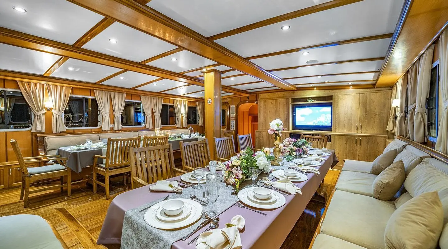 Tersane 8 yacht dining area aboard a luxury gulet at sunset with table setting