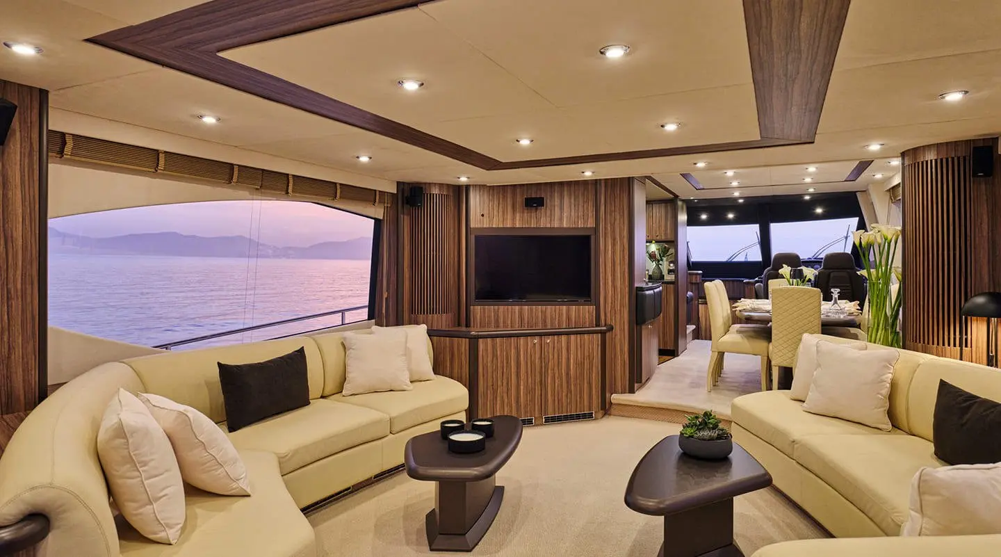 Luxurious yacht salon interior on M Five, dusk light through windows