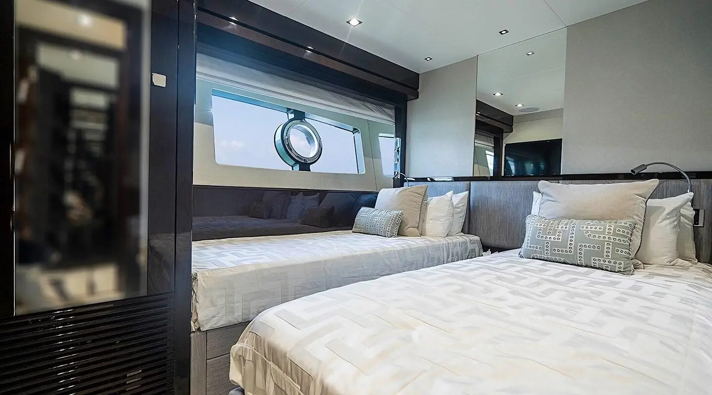 Luxurious yacht Quantum bedroom with large bed and panoramic window