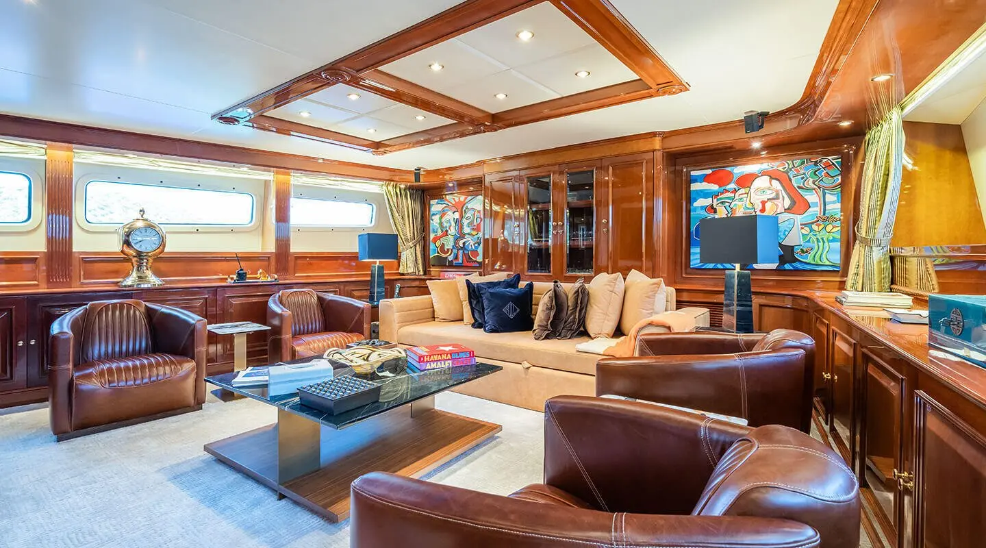 Luxurious Amadea yacht salon with plush seating and large windows