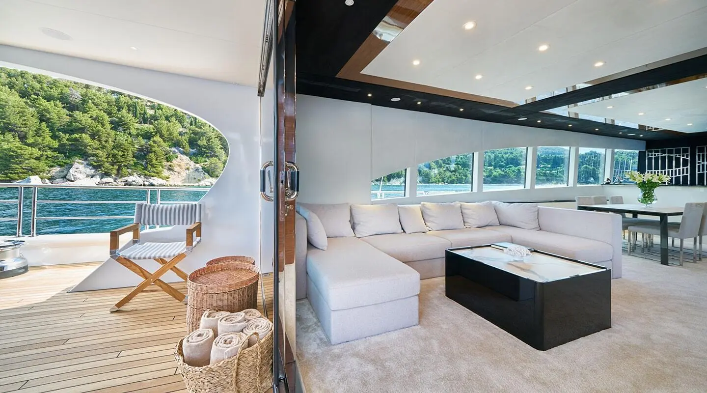 Acapella yacht salon entrance area with seating and open deck views