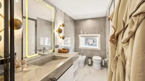 Interior bathroom on North Wind yacht with sink, mirror, and vanity