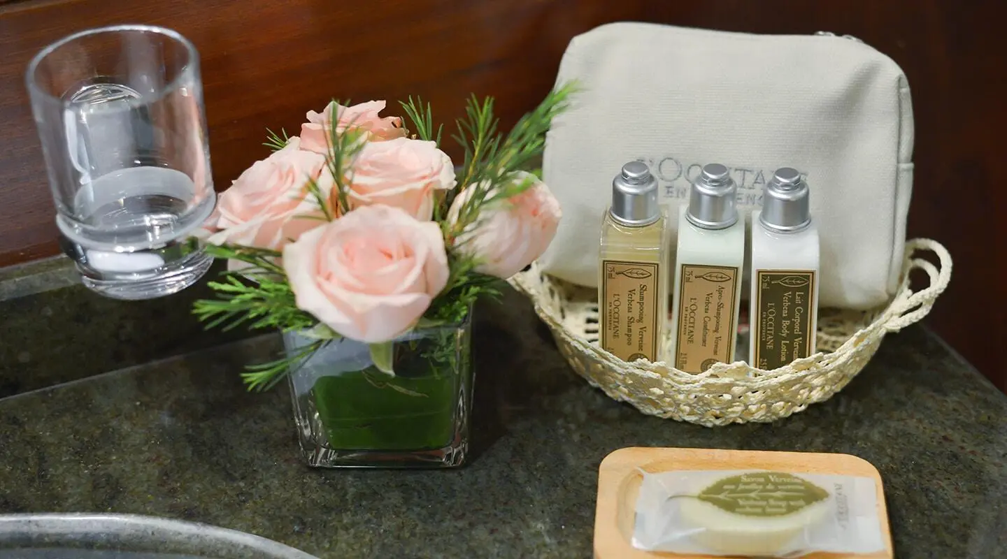 Lady Christa luxury gulet at sunset with roses and bottles on deck