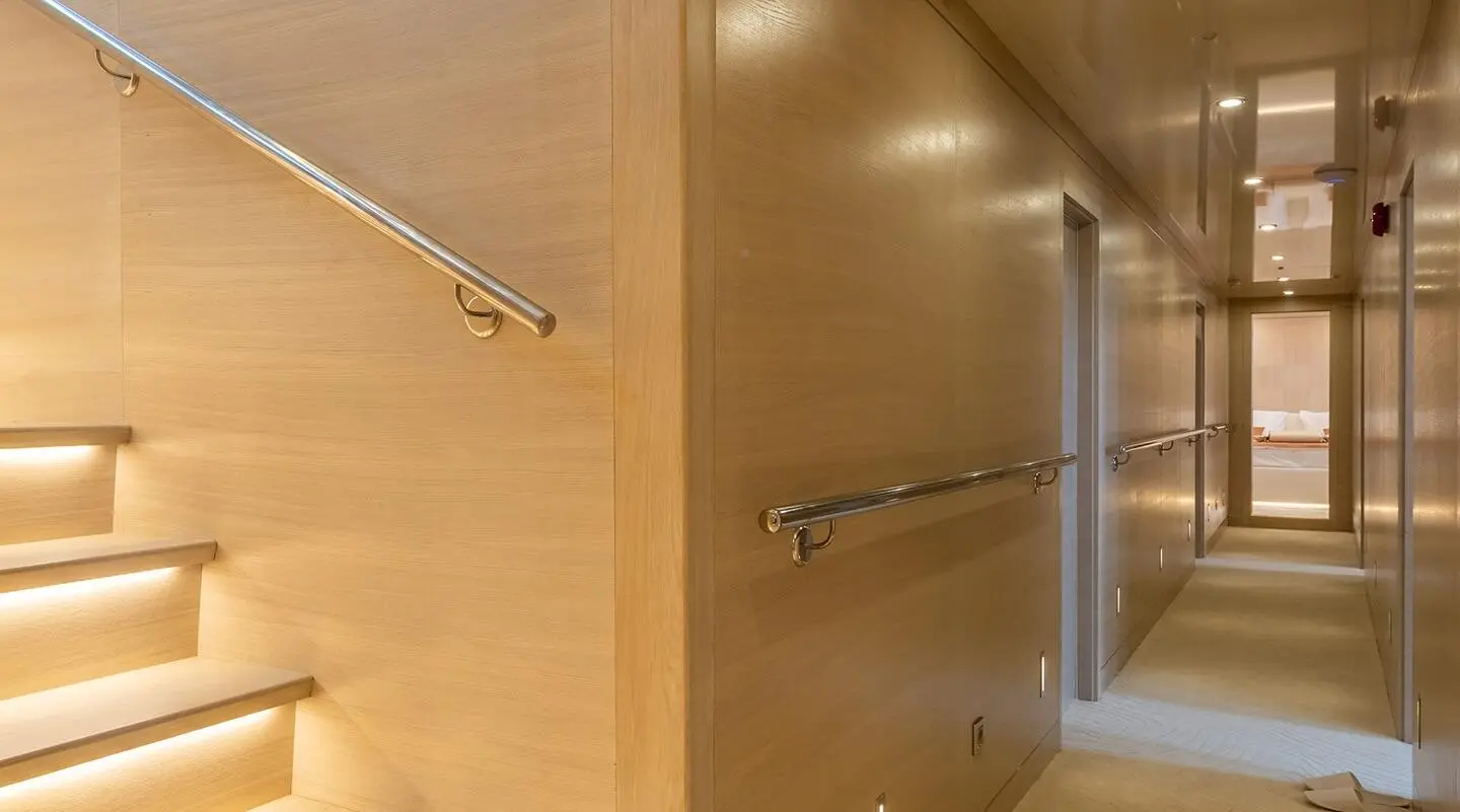 Love Story yacht with a luxury gulet at sunset, deck railings and warm wooden tones