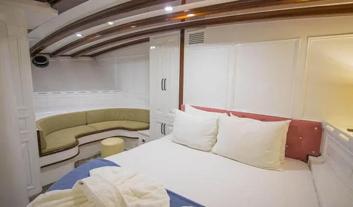 Grande Mare yacht master cabin with king bed and ensuite bathroom details