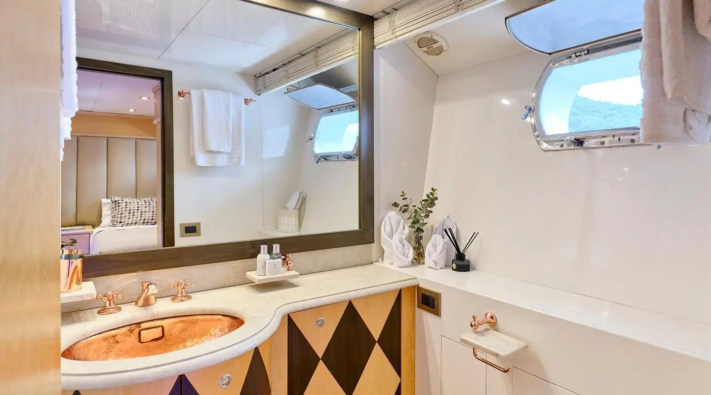 Mobius yacht exterior seen through a windowed interior with decorative patterns