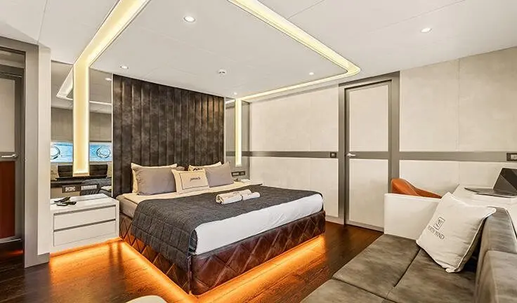 North Wind yacht master cabin with king bed, ensuite visible, modern decor