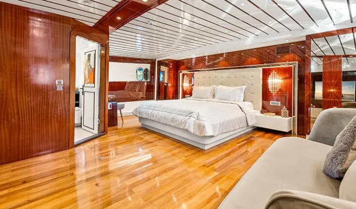 Esma Sultan master cabin with king bed, wood floors, and ensuite